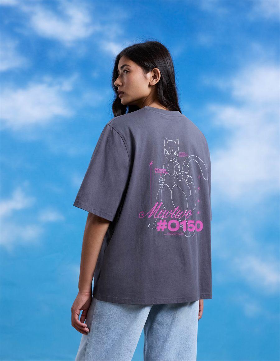 T-shirt Mewtwo de la collection femme celio x Pokémon, contour blanc et rose vif