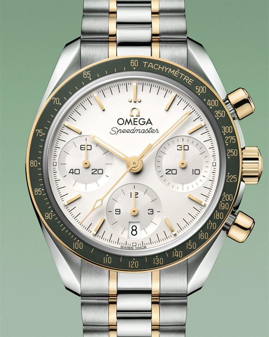 Speedmaster 38 acier et or Moonshine, lunette verte et cadran opalin argente