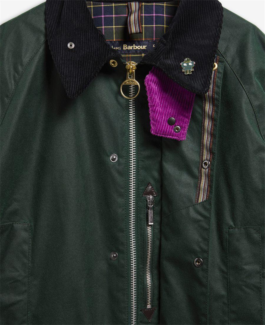 Détail du tartan Barbour x Paul Smith en doublure, rose et jaune sur fond bleu et vert