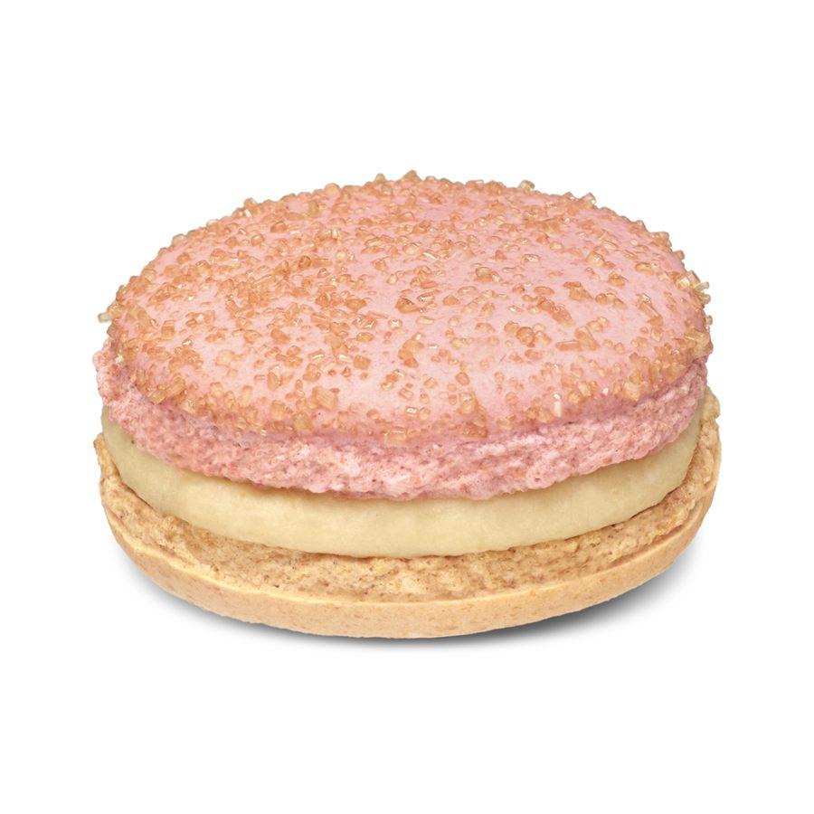Macaron Vénus, coque rose roulée dans des cristaux de sucre ambrés et seconde coque jaune pâle