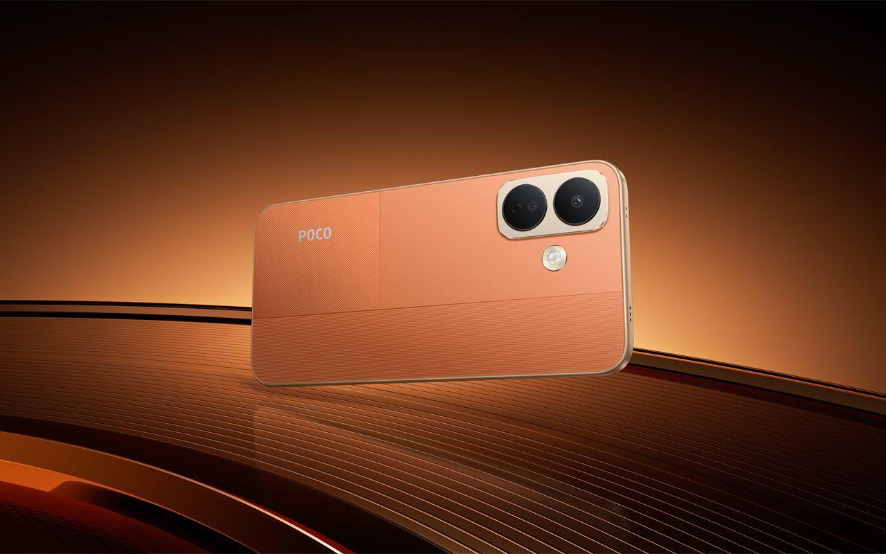 Dos du POCO X8 en coloris orange, avec son bloc photo à deux cercles
