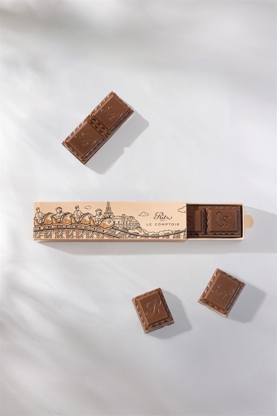 Barre caramel chocolat au lait Ritz Paris Le Comptoir et son étui aux montagnes russes
