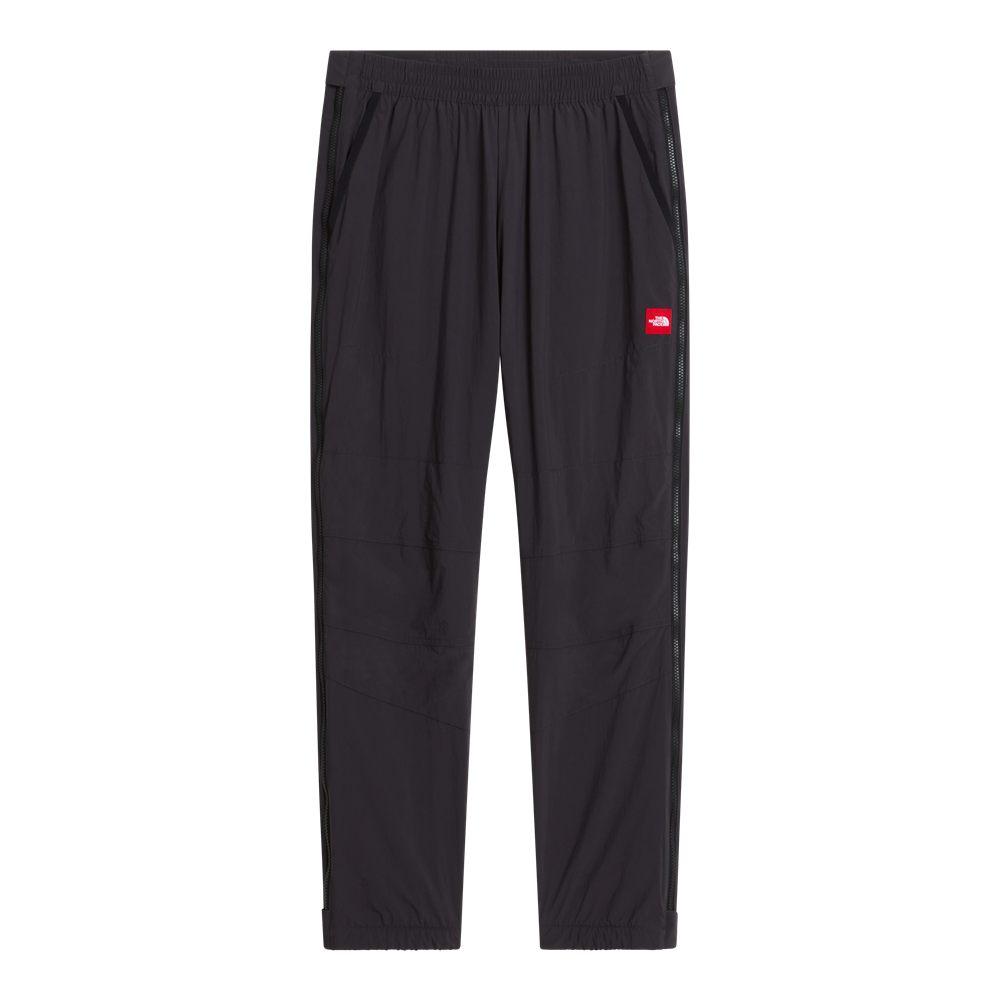 Le pantalon entièrement zippé Red Box, fermetures sur la longueur des jambes