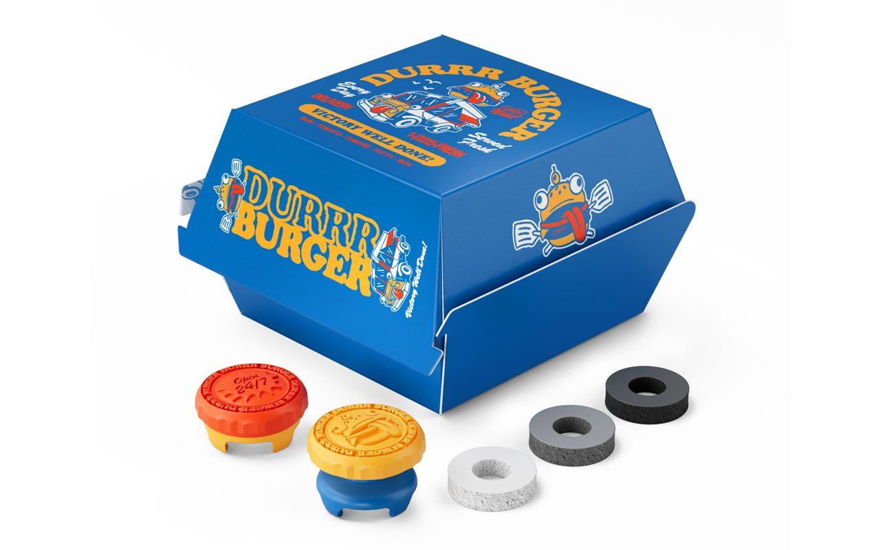 KontrolFreek Aim Boost Kit Fortnite Durrr Burger Edition, rehausseurs et anneaux devant sa boîte