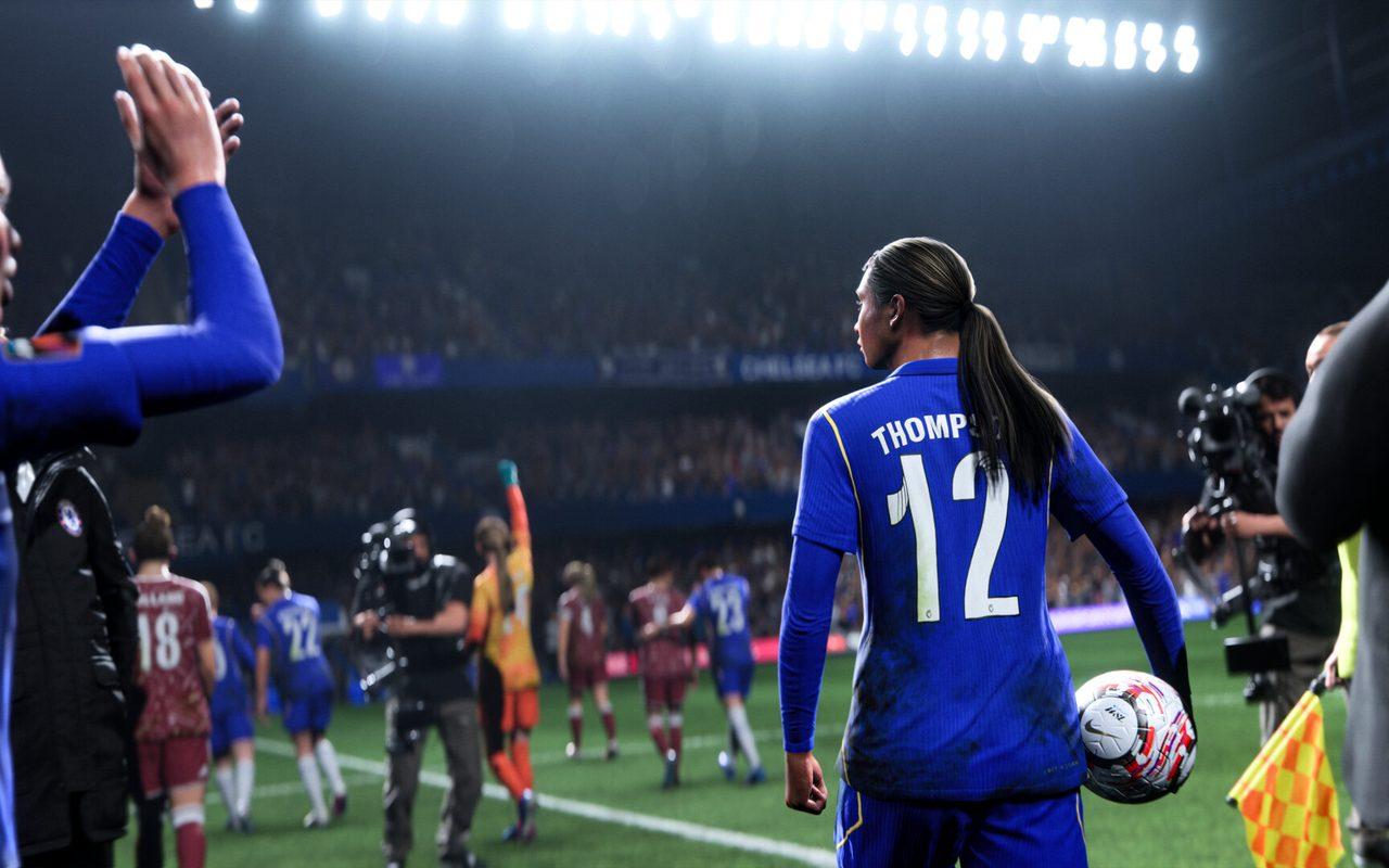 Une joueuse de Chelsea lève la main, caméras de télévision en bord de terrain, dans EA Sports FC 27