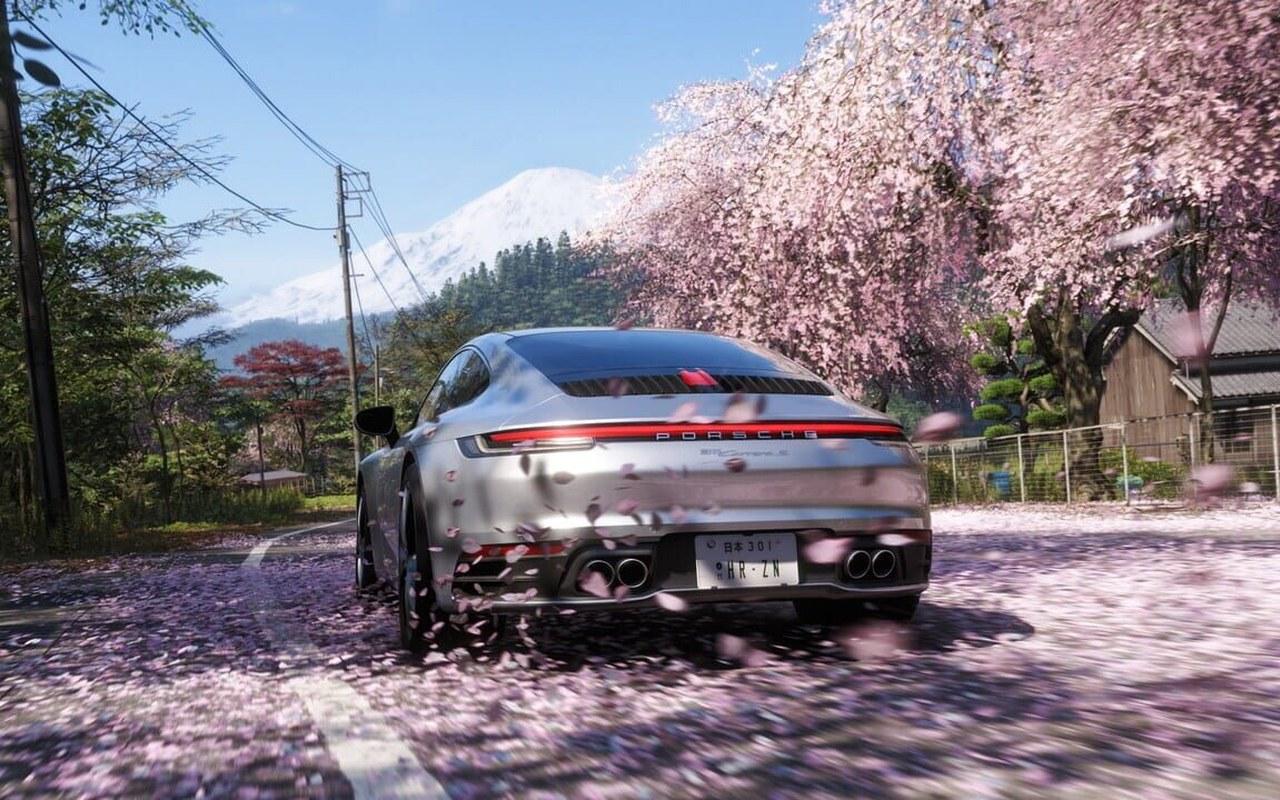 Porsche 911 sous les cerisiers en fleur face au mont Fuji dans Forza Horizon 6
