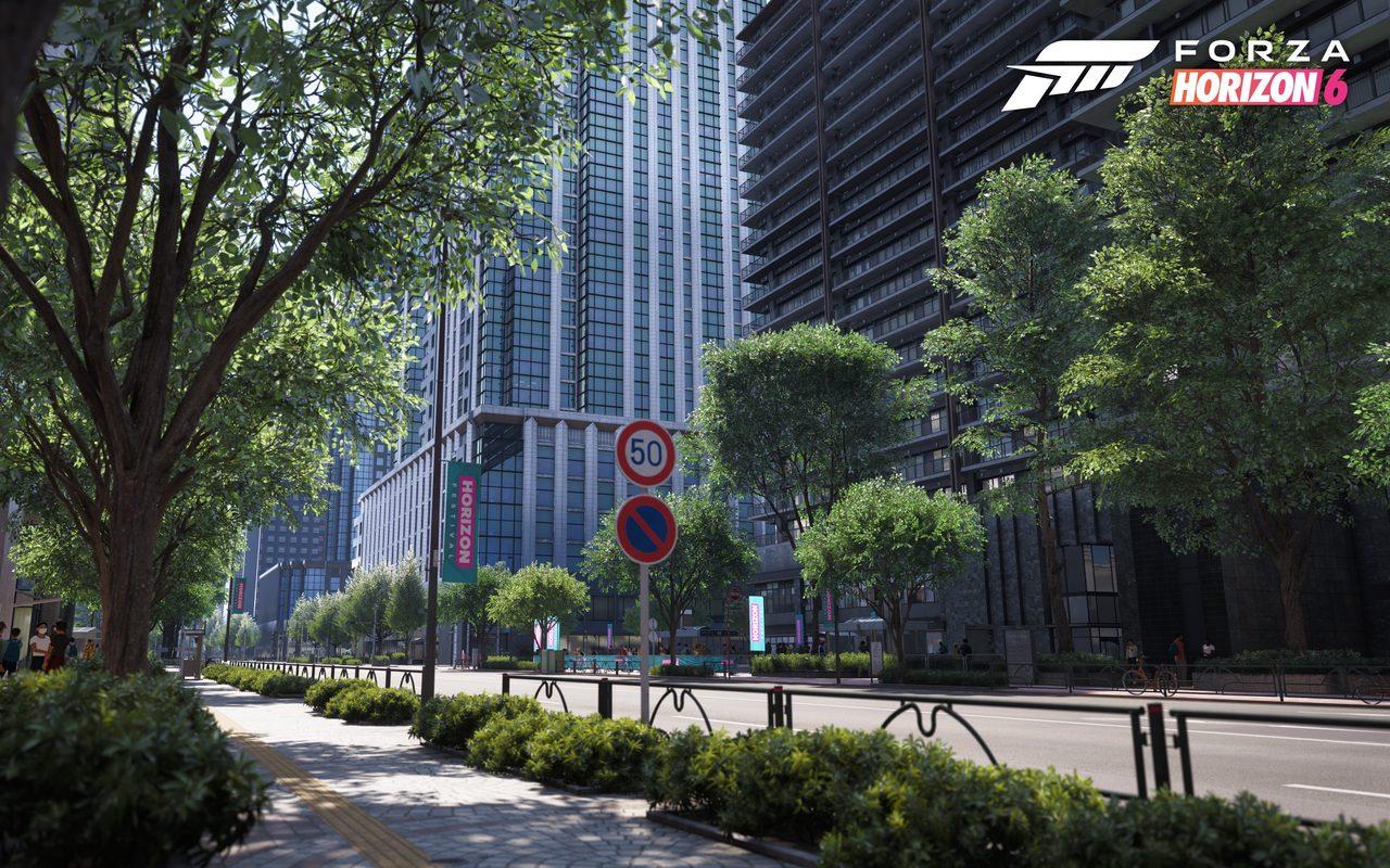 Avenue arborée bordée de tours dans le Tokyo de Forza Horizon 6