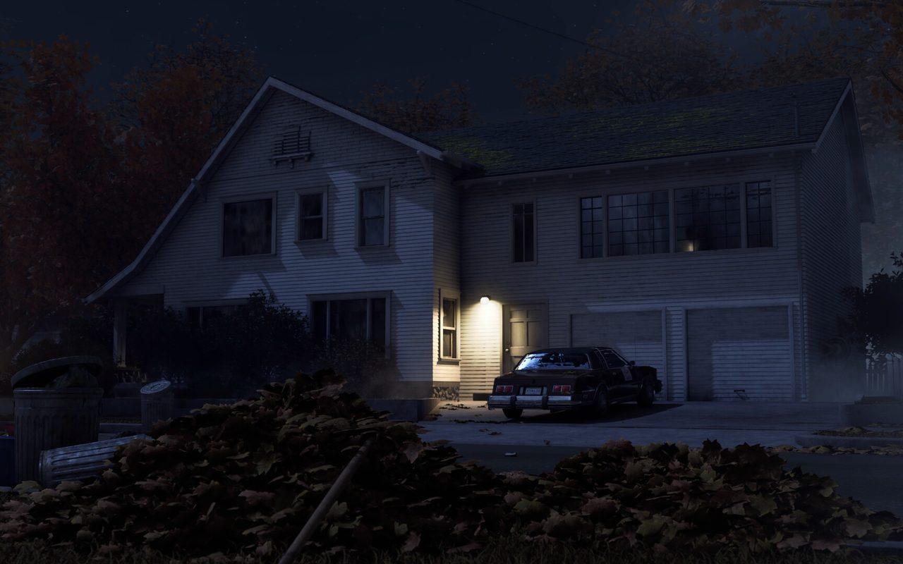 Une maison de banlieue de Haddonfield éclairée dans la nuit, une voiture des années 70 devant