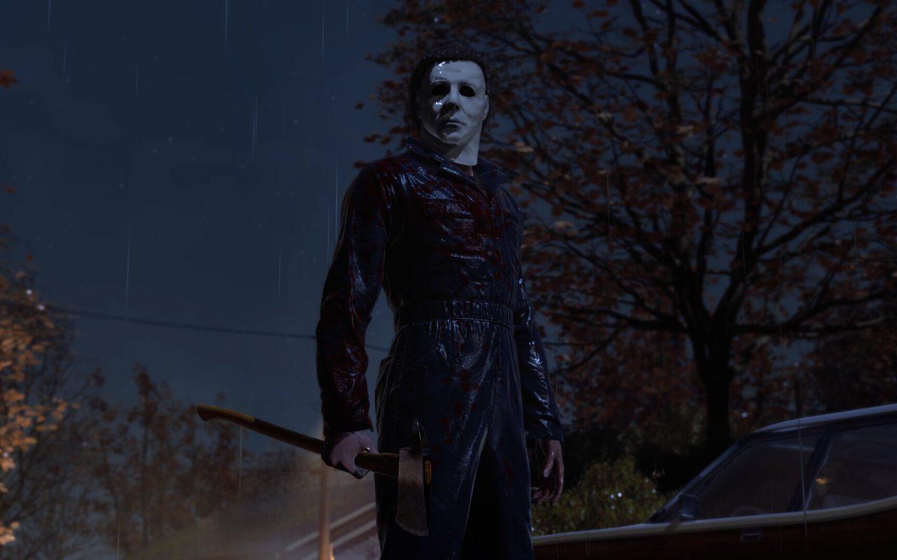 Michael Myers, masque blanc et hache en main, sous la pluie dans Halloween: The Game