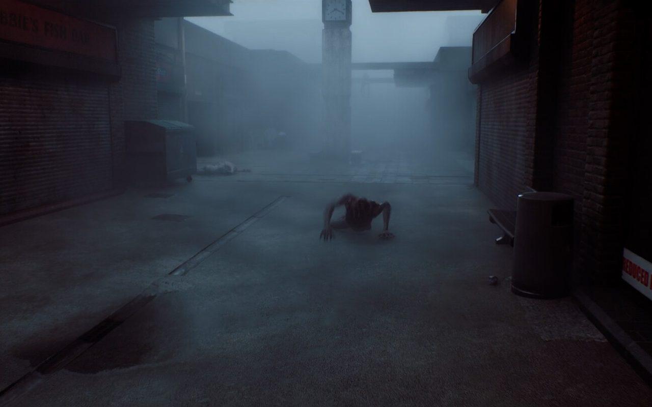 Une créature rampe au milieu d'une rue de St. Amelia envahie par la brume