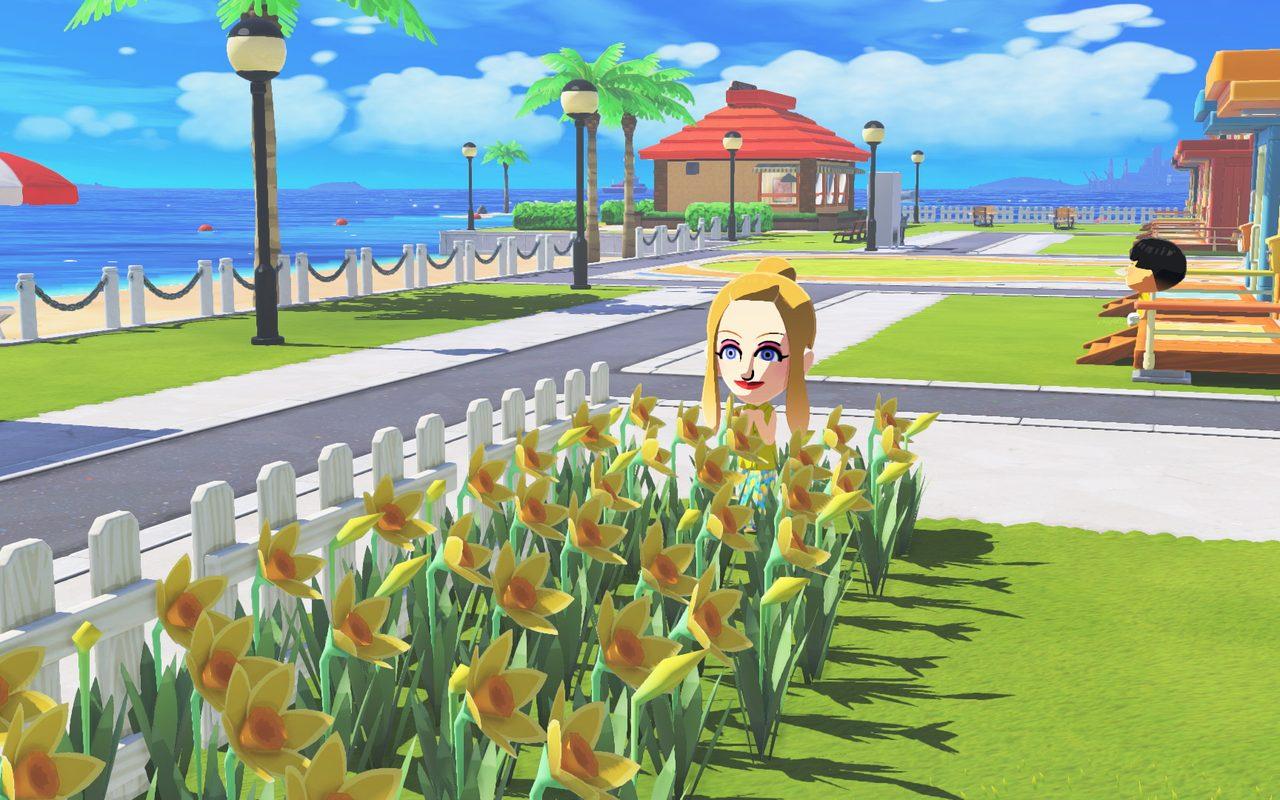 Un Mii au milieu d'un champ de jonquilles, la mer en arrière-plan