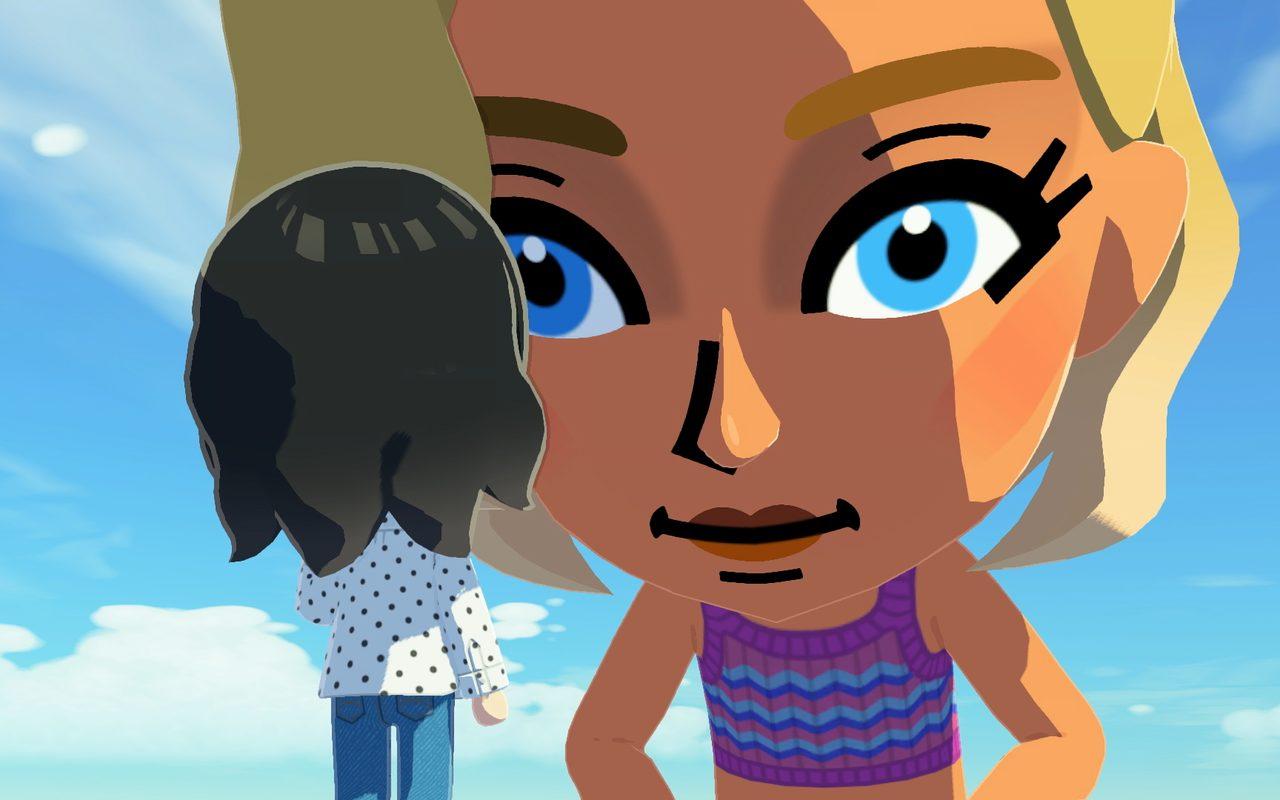 Gros plan sur le visage expressif d'un Mii face à un autre