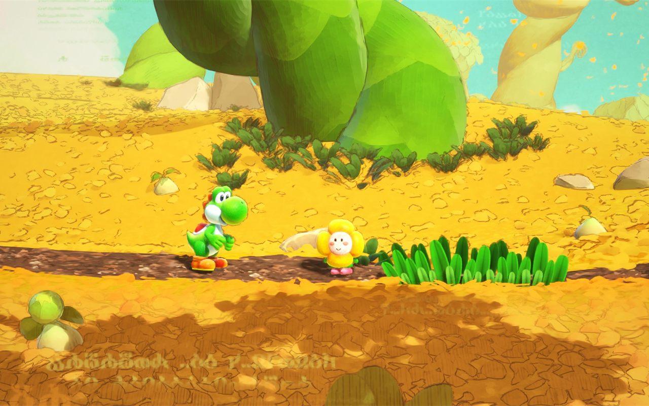 Yoshi face à une créature fleur sur un chemin doré, dans Yoshi and the Mysterious Book